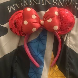 Pink sequins on ears